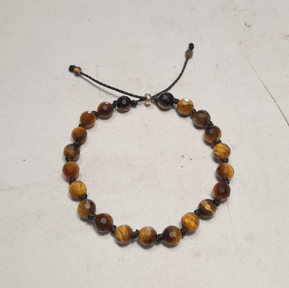 Bracelet réglable en Œil de Tigre naturelle sur fil de coton ciré. Idée cadeau femme.