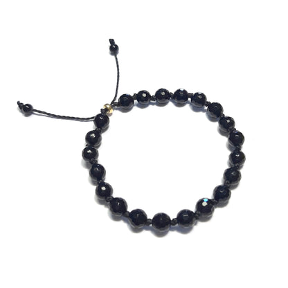 Bracelet artisanal en pierre naturelle noire, style épuré