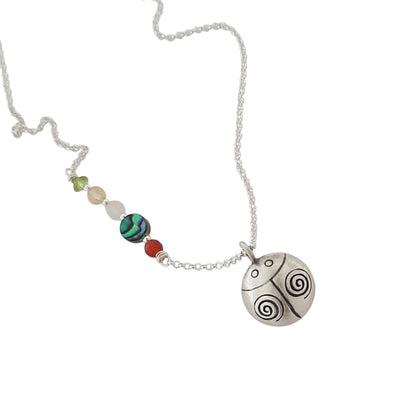 Bijou spirituel coccinelle argent avec boule sonore