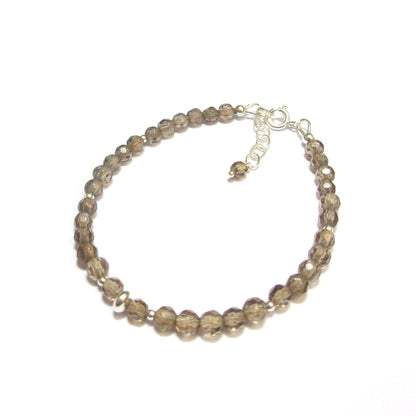 Bracelet intemporel en argent 925 et pierres naturelles: quartz fumé.